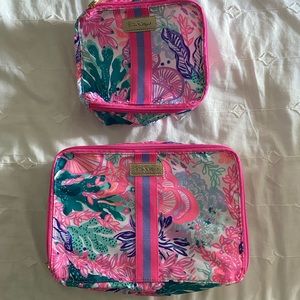 Lilly Pulitzer stackable pouches in Multi Carnivale Seaside print. Set of 2